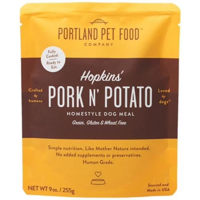 Pet Essentials Hub PRTPET Pork and Potato dog food, 8-pack 9oz cans, showcasing the premium dog food product with branding.