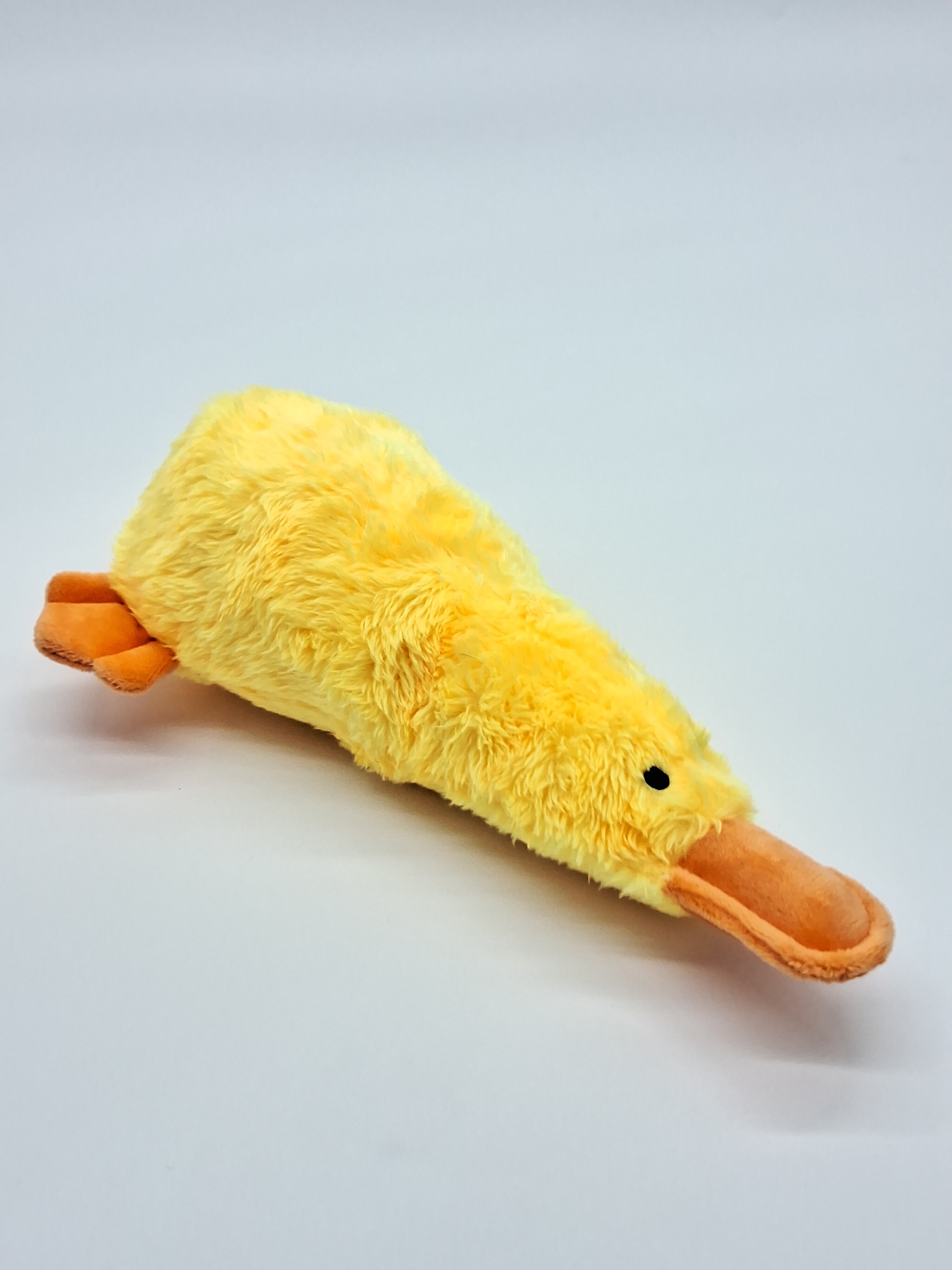 Colorful Platz the Platypus pet toy from Toys N Treats Box, designed for dogs to chew and play with.