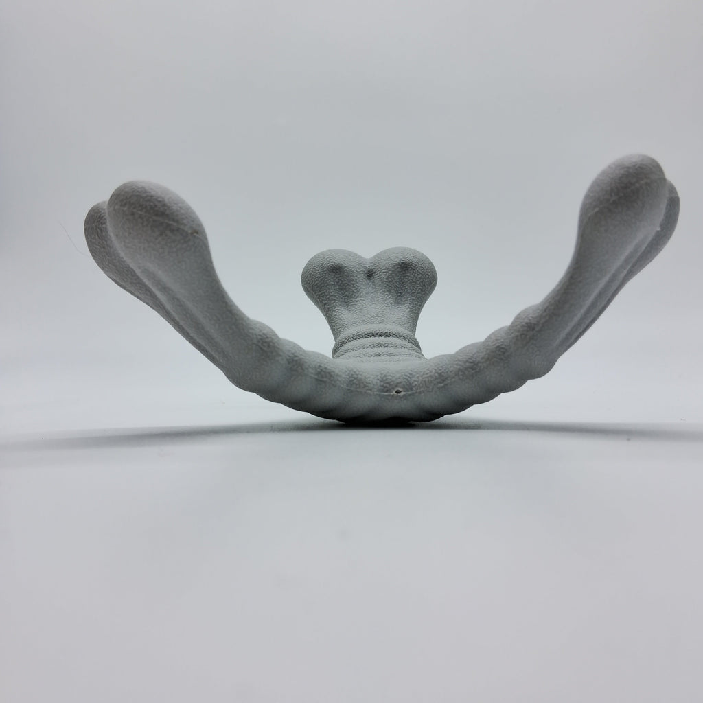 Tri-Bone XL pet toy from Toys N Treats Box featuring durable rubber material and multiple chew surfaces for dogs.