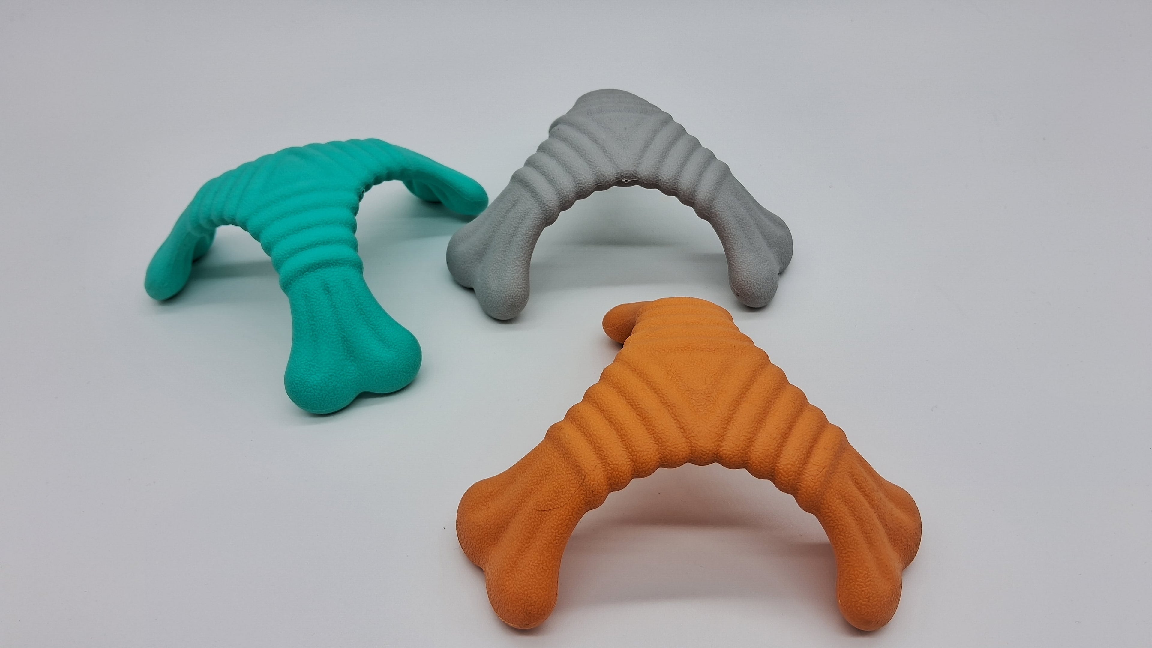 Tri-Bone XL pet toy from Toys N Treats Box, durable chew bone for dogs, with multiple texture areas for added play and dental health.