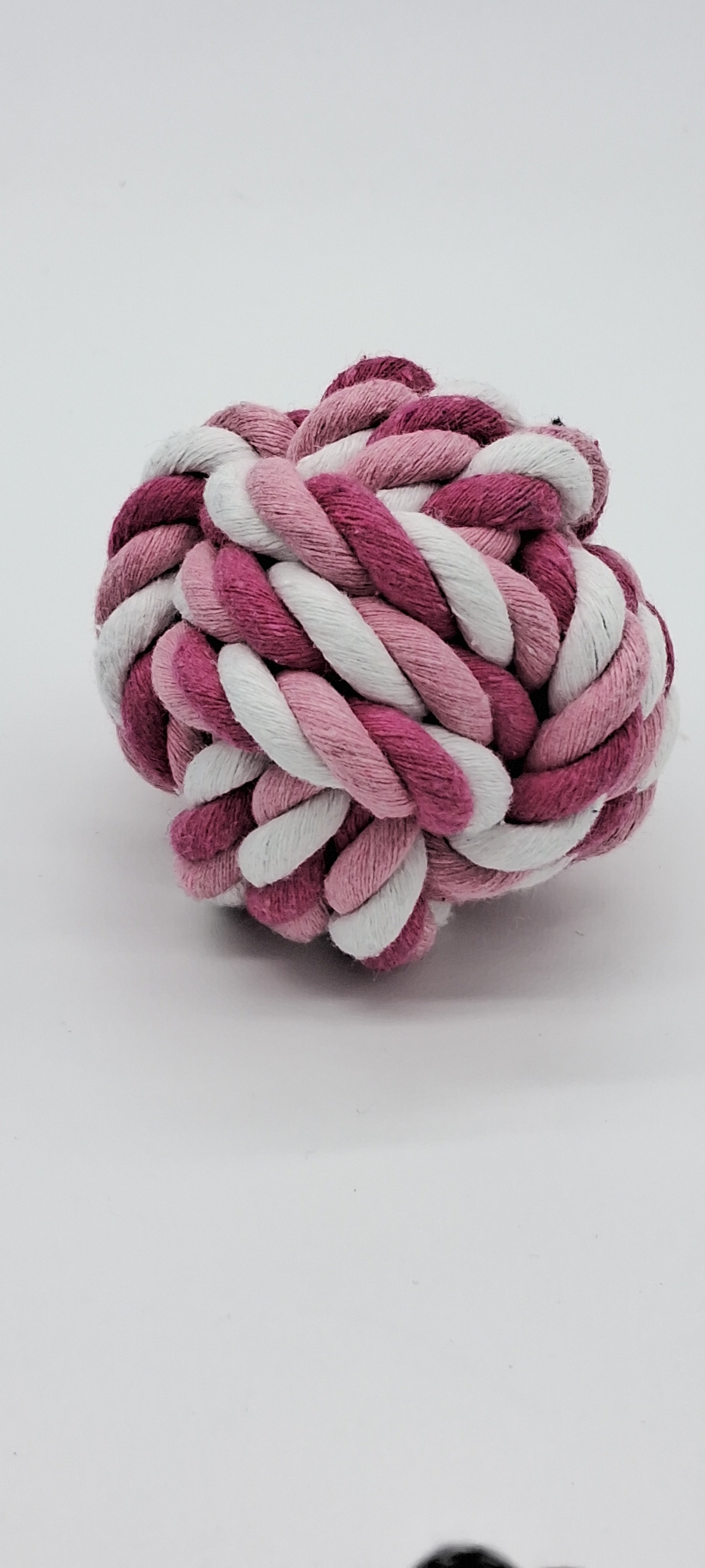 Fetch Ball pet toy from Toys N Treats Box, durable rubber ball for dogs, perfect for play and exercise.