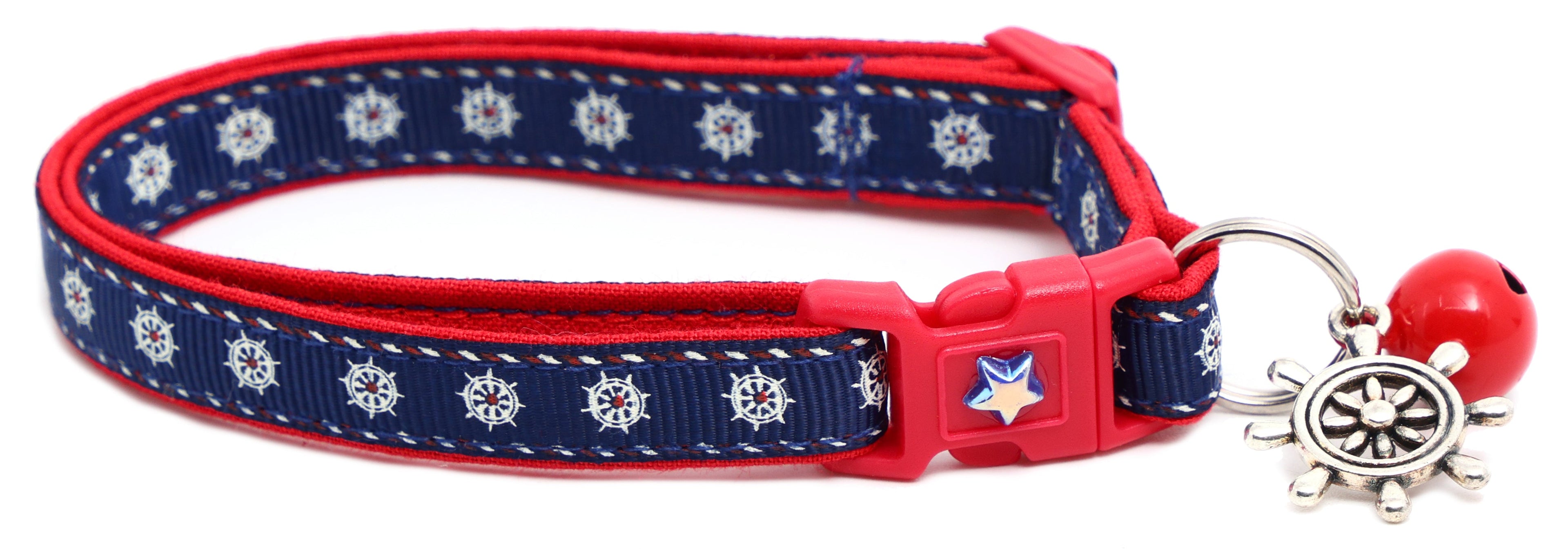 Nautical design Ships Wheels Breakaway Cat Collar by Pugs2Persians featuring a nautical wheel pattern on a blue collar for cats.