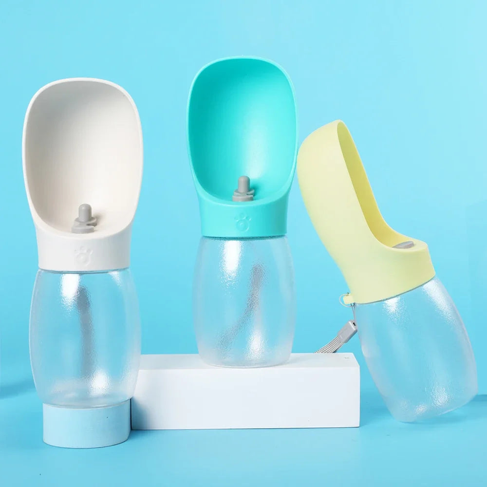 Portable Pet Water Bottle and Travel Feeder by Pet Essentials Hub, 300ML, compact design for on-the-go pet hydration and feeding.