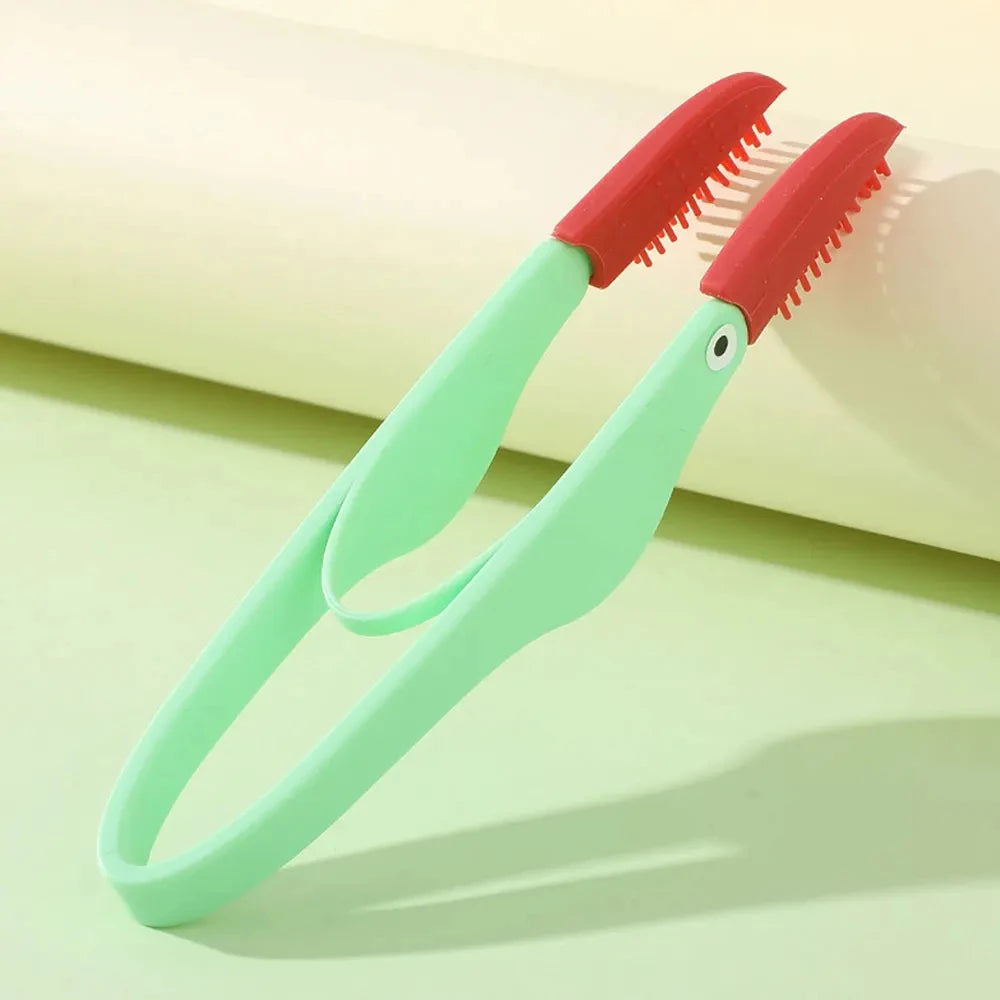 Pet silicone tear remover comb by AllDay Goods, eye cleaning tool for gentle grooming of pets' tear stains and eye area.