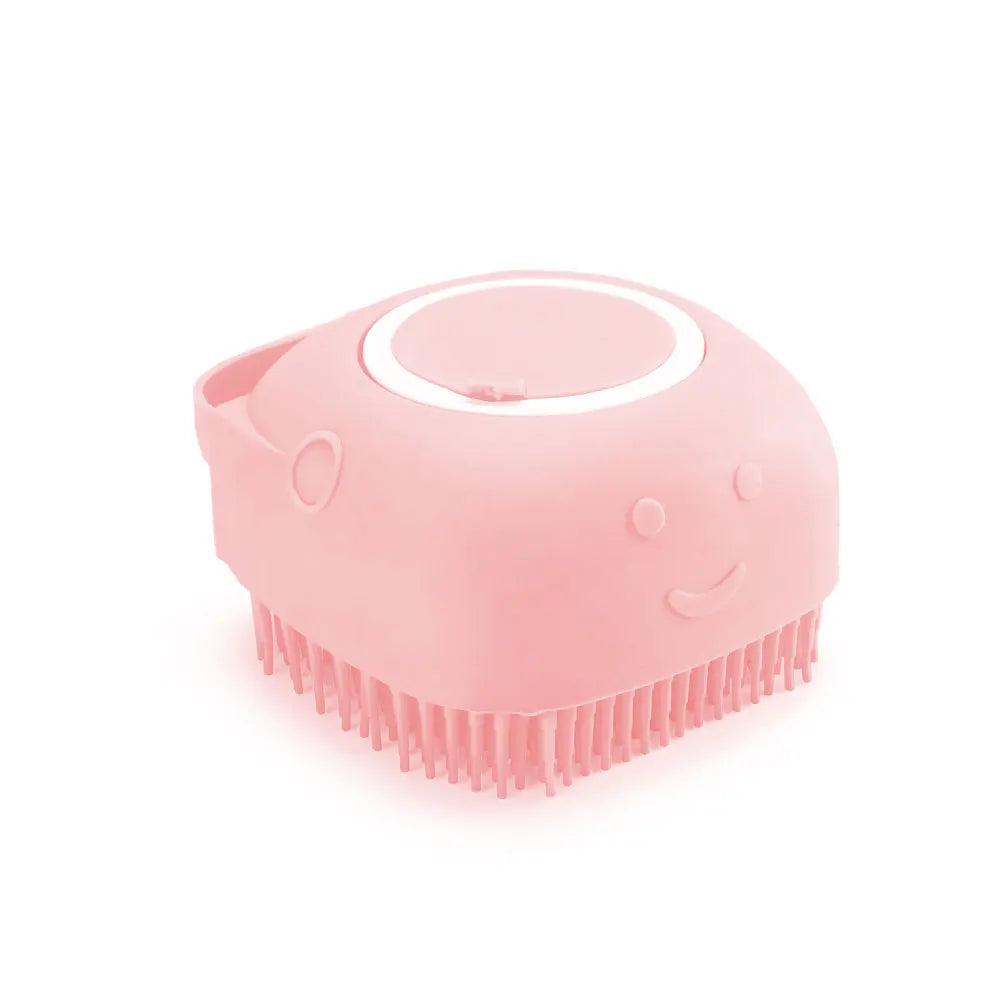 Silicone pet bath brush from Pet Essentials Hub with massage bristles and built-in shampoo dispenser for dogs and cats.