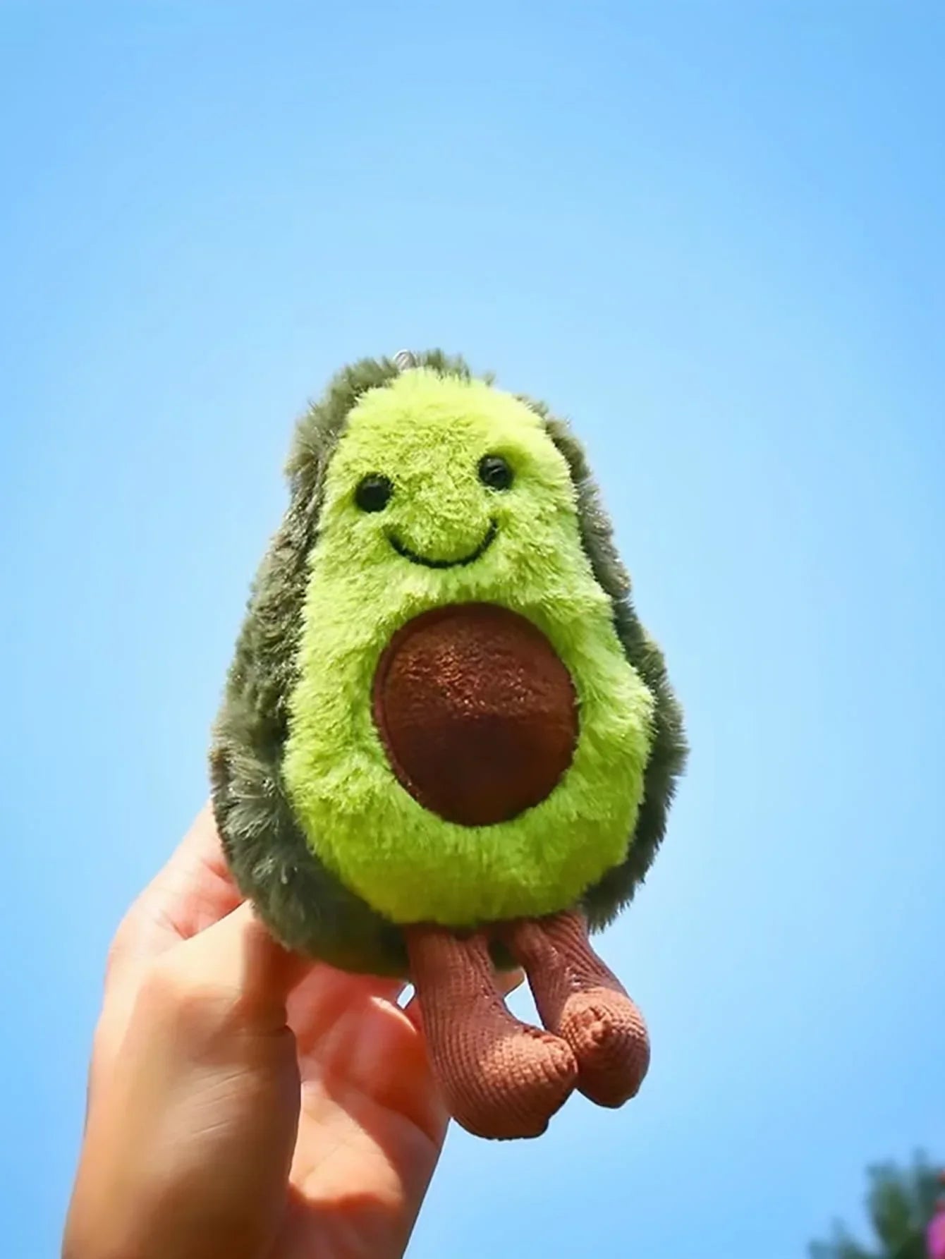 Cute plush avocado-shaped cat toy from Pet Essentials Hub, soft and colorful pet toy for playful cats.