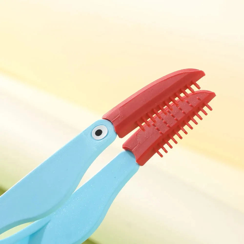 Pet silicone tear remover comb by AllDay Goods, eye cleaning tool for gentle pet grooming and tear stain removal.