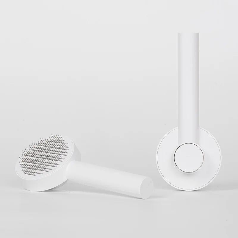 AllDay Goods cat hair cleaner brush with massage comb for pet grooming, featuring soft bristles and ergonomic handle.