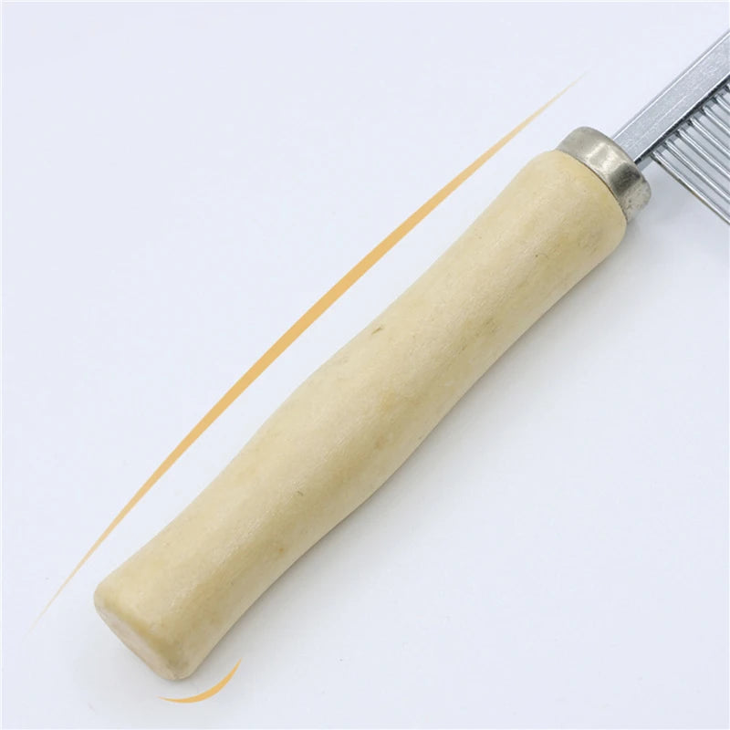 Dog grooming hair remover with a wooden handle, designed for cats, by AllDay Goods, showing the comb with fine teeth for pet grooming.