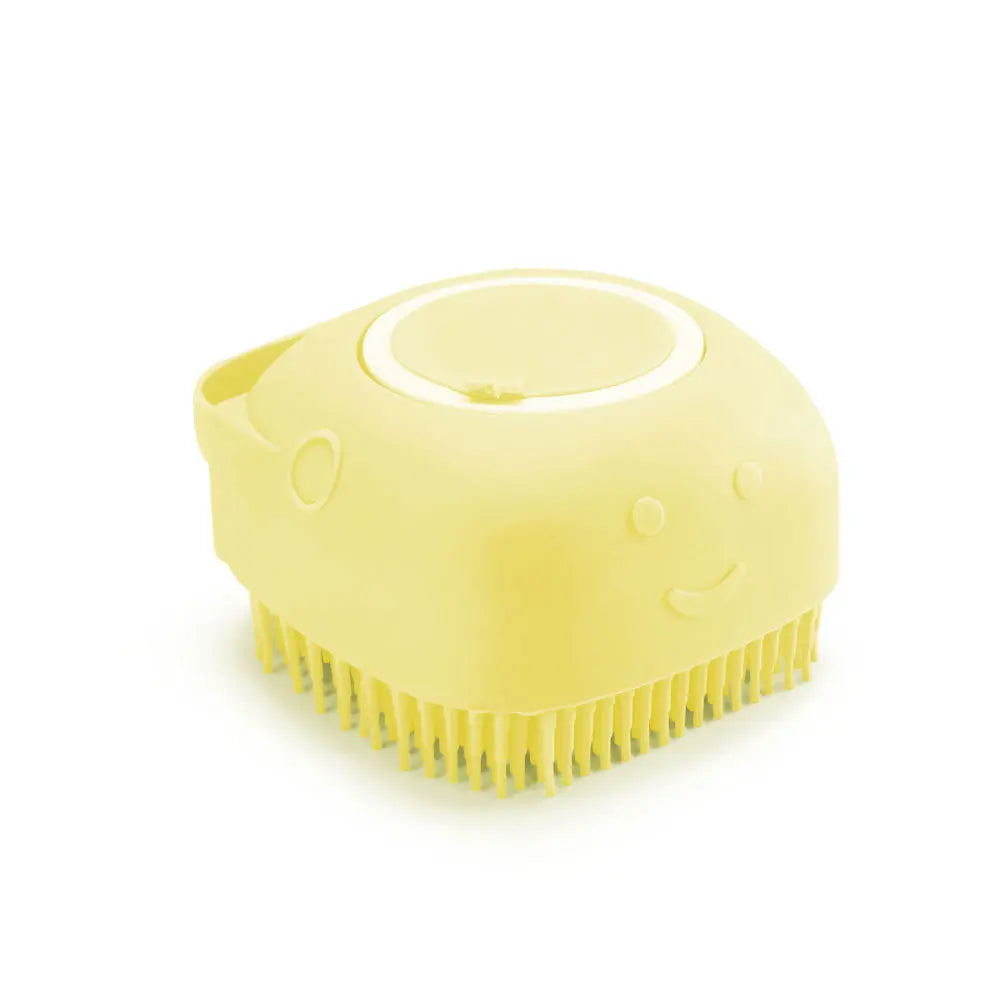Silicone pet bath brush from Pet Essentials Hub with massage bristles and shampoo dispenser for dogs and cats during grooming.