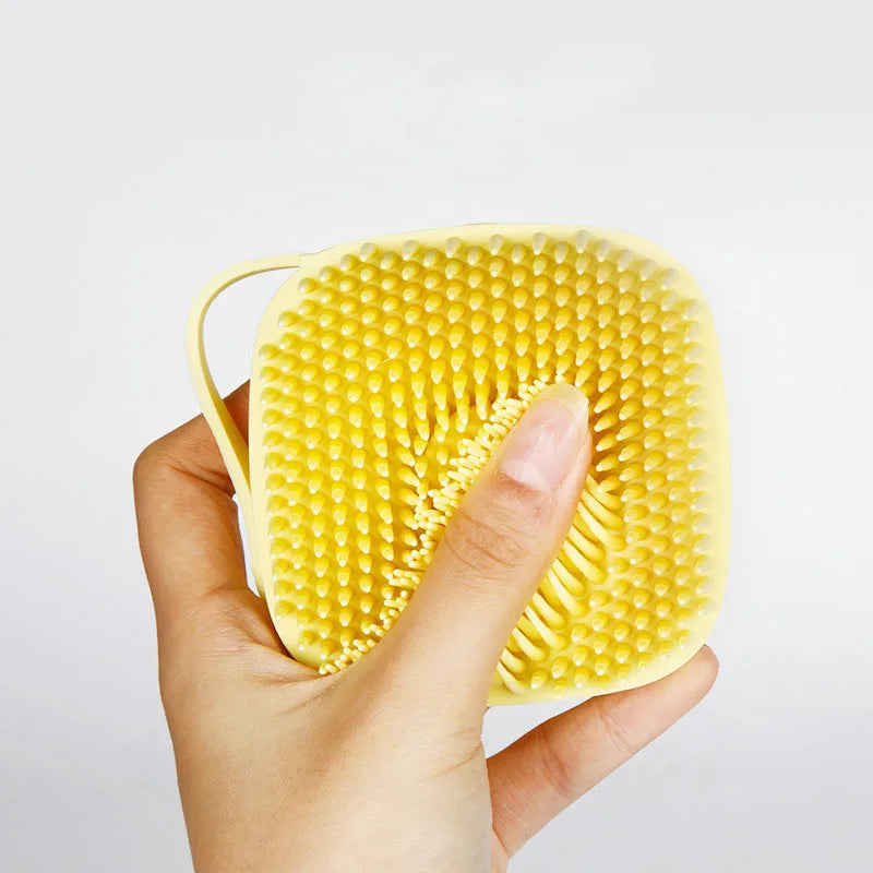 Silicone pet bath brush from Pet Essentials Hub, showing a dog and cat being groomed with massage and shampoo dispenser.