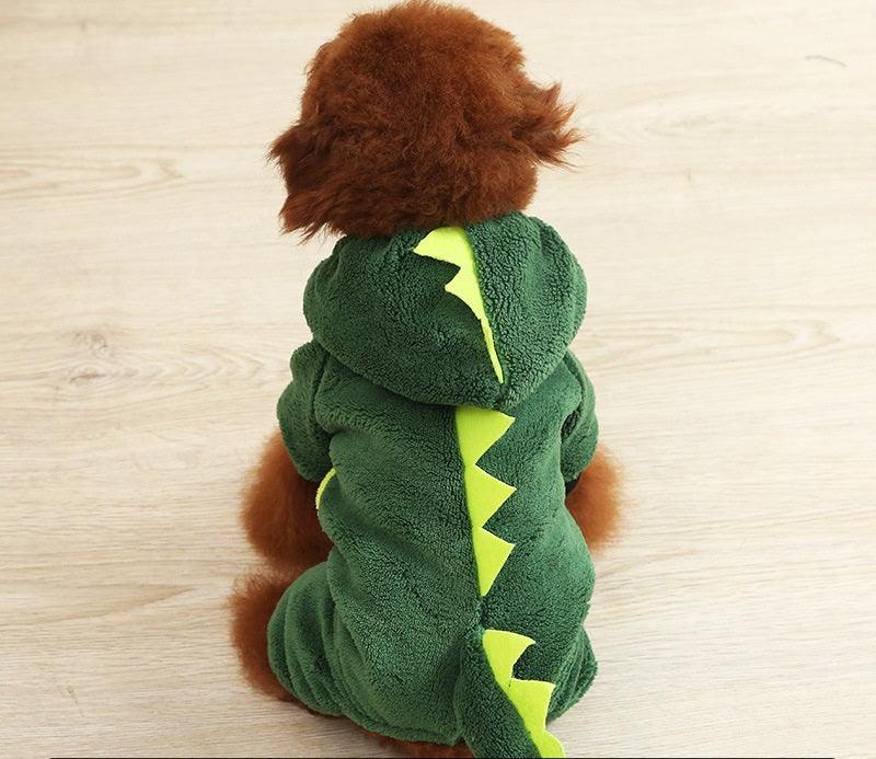 Cozy coral fleece dog costume featuring a cartoon-style dinosaur and lion design from Dog Hugs Cat for autumn and winter.