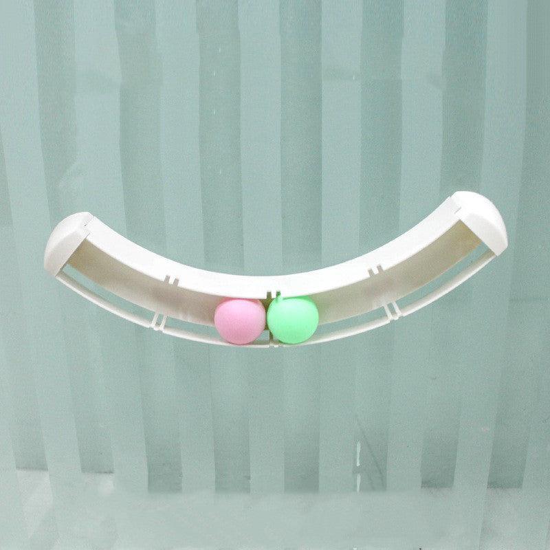 Dog Hugs Cat curved track interactive cat toy with a colorful, winding track and playful ball for engaging feline entertainment.